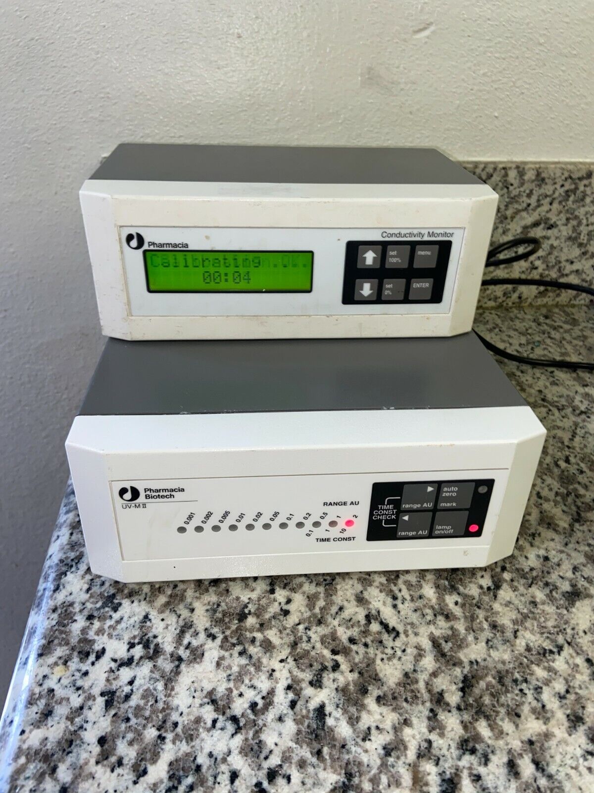 Pharmacia Biotech Conductivity Monitor, and UV-M II UV Monitor